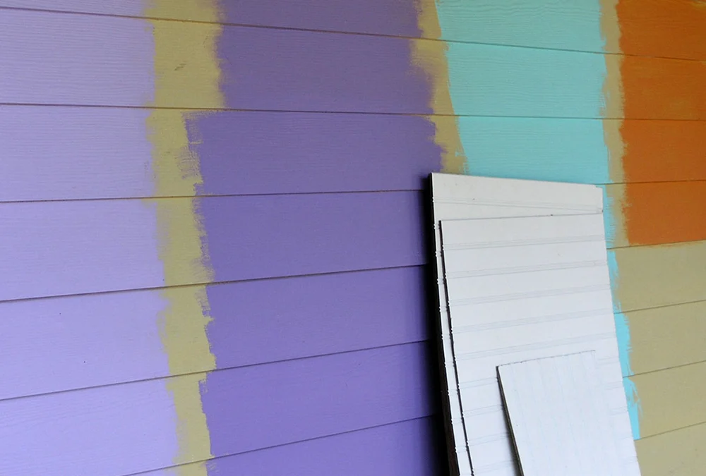 Paint color samples on an exterior wall